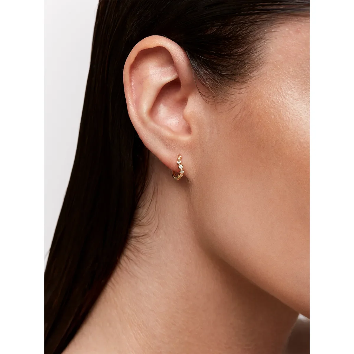 14kt Diamond Bezel Wave Huggies - Image 2