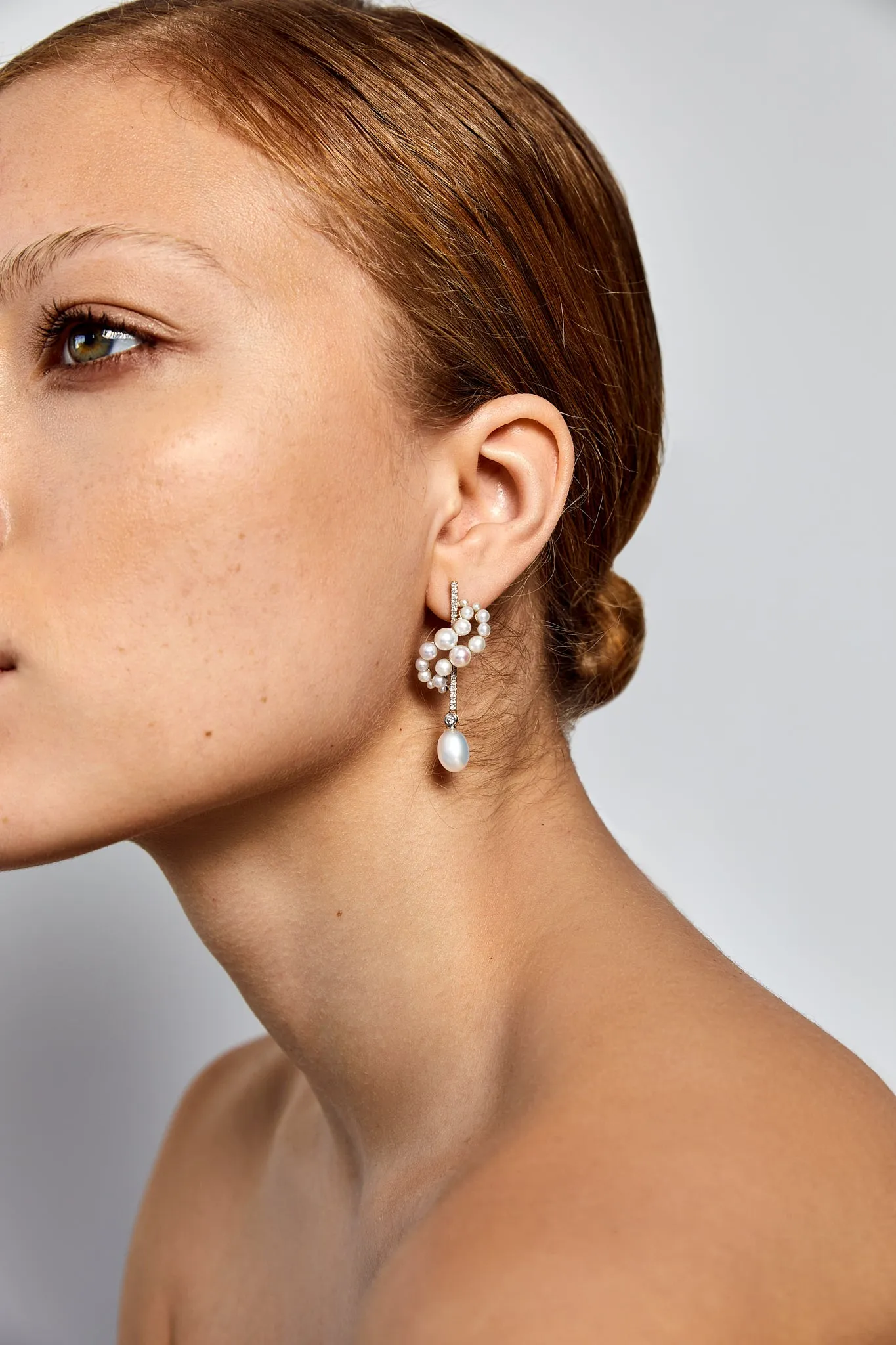 Gold Pearl Curve Form Earrings - Image 3